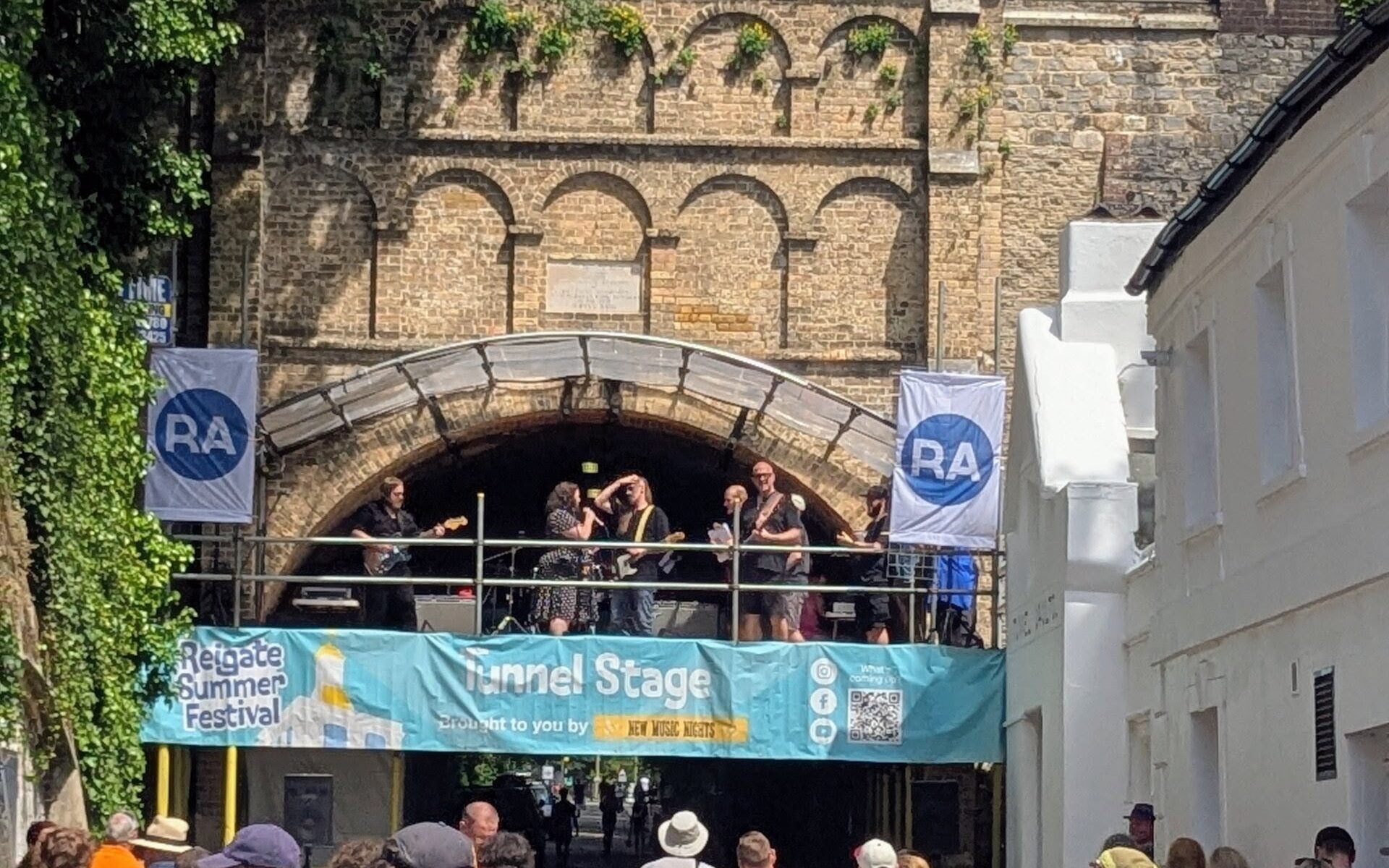 The completed Tunnel Stage at Reigate Summer Festival, designed by Reigate Architects using the historic Reigate Tunnel as the backdrop.